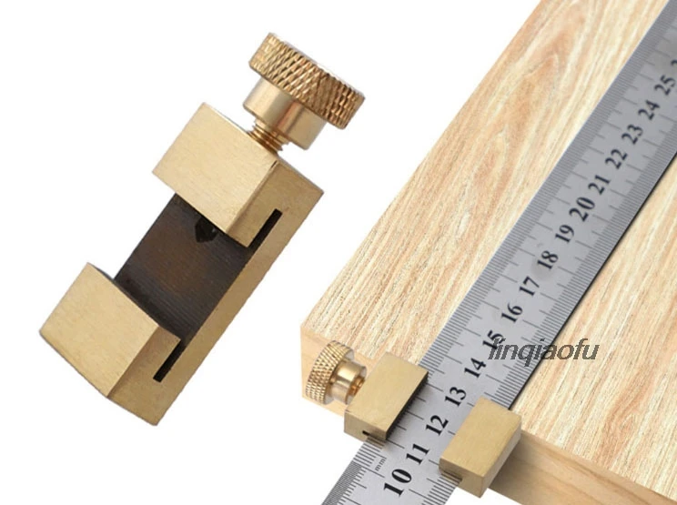 

Wood ruler positioning block for steel ruler positioning block