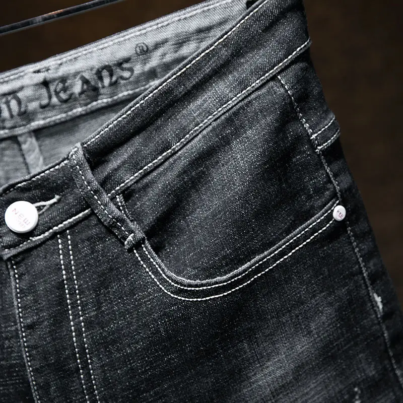 Mens jeans spring and summer four seasons jeans men's slim elastic black feet pants Korean trend casual straight trousers