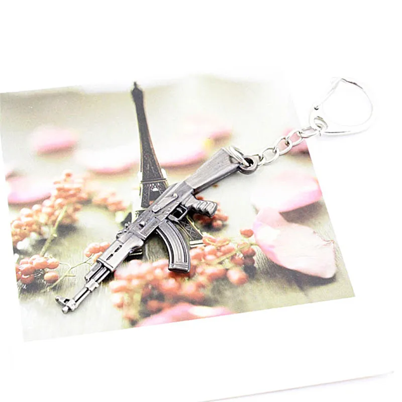 Ключница в форме оружия Novelty Weapon Gun Keychain CF AK47 Mode Pendant Key Chain Chaveiro Holders Ring For Men'S Gifts размером 6 см.