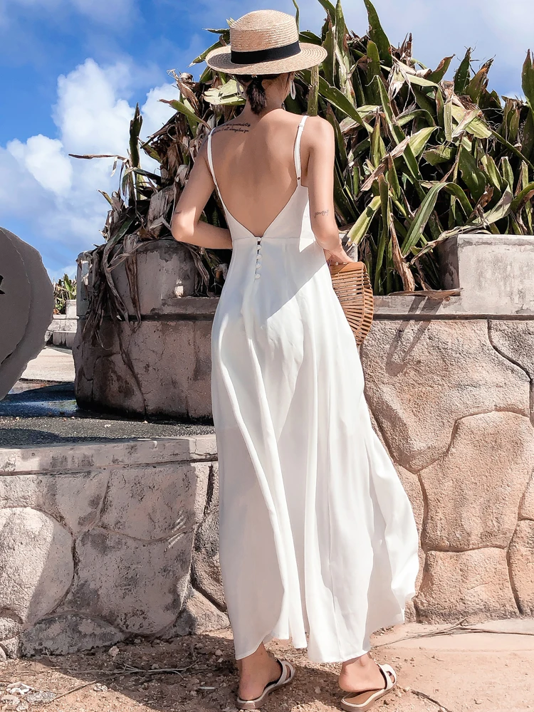 

Maldives beach skirt female summer white backless long skirt sexy Thailand seaside holiday dress super fairy