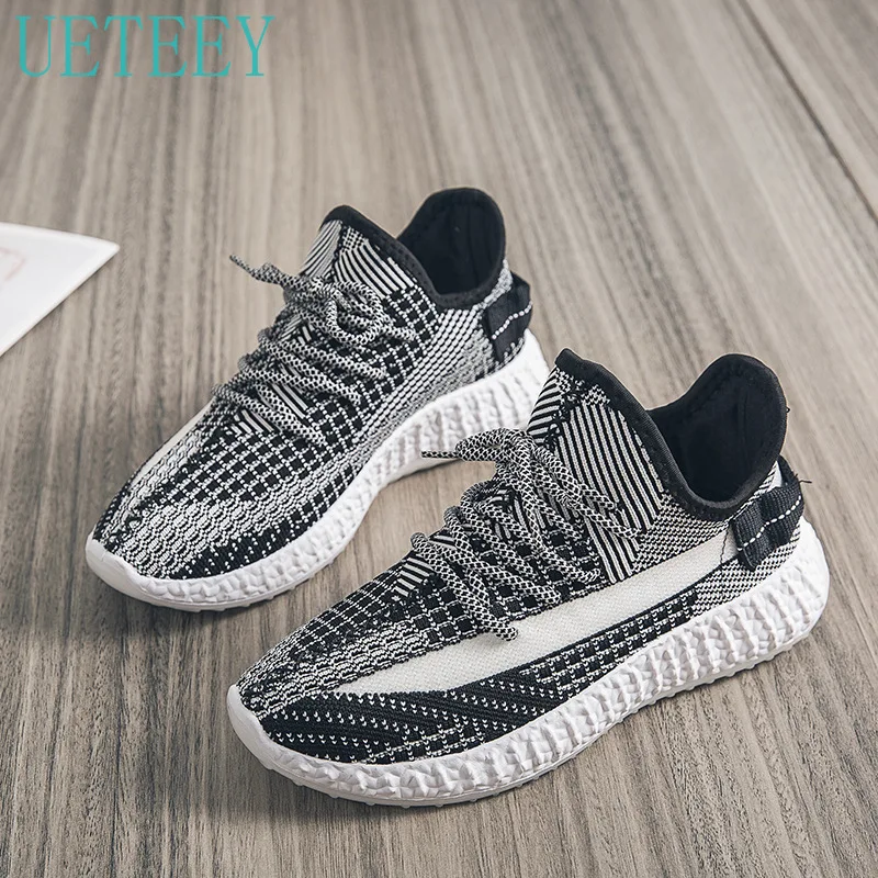 

2021 Autumn and Winter Ladies Coconut Shoes Flying Woven Shoes Black and White Sports Shoes Breathable Running Casual Shoes