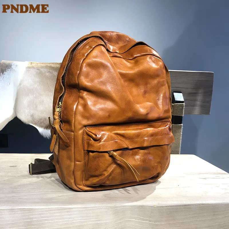 

PNDME high quality genuine leather men's outdoor travel backpack luxury natural real cowhide women's bookbag designer bagpack