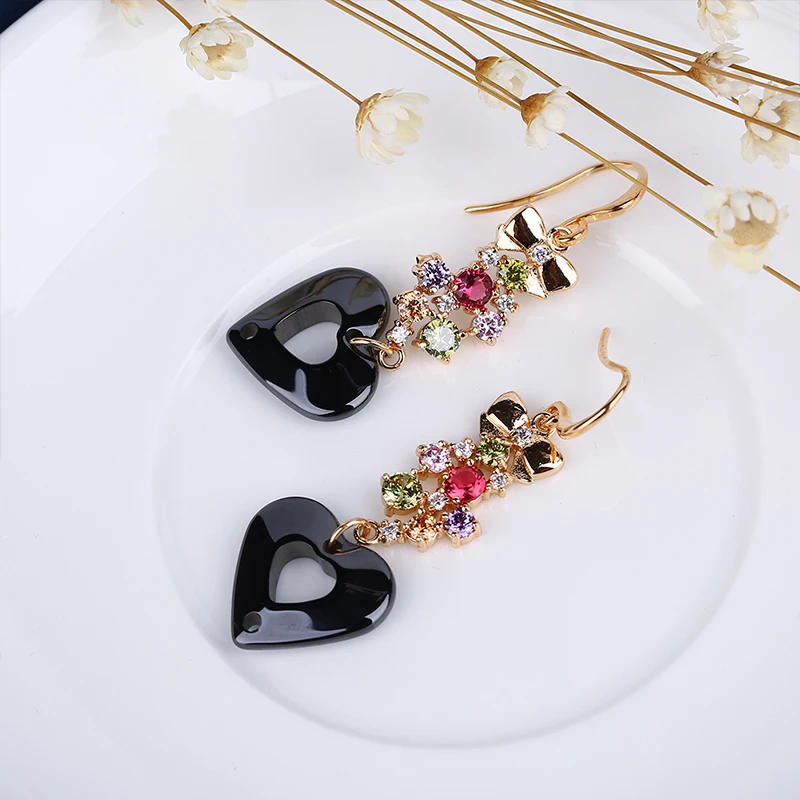 TUHE женские серьги розовое золото бант с цветными стразами черные керамические