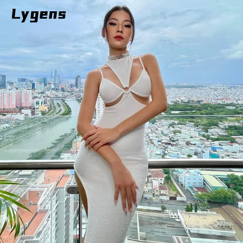 

Lygens 2021 Autumn Ribbed Knitted Women Sleeveless Hollow Out Midi Dress Lace Up Side Slit Bodycon Sexy Streetwear Party Club