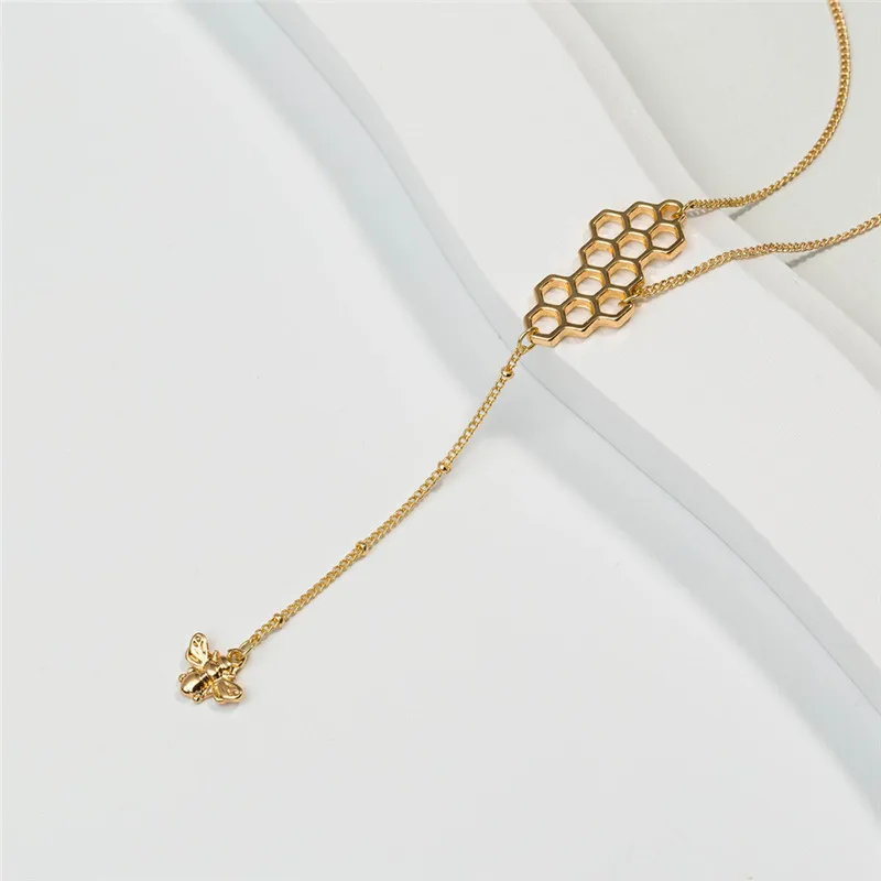 

Cute Honeycomb Bee Pendant Necklace For Women Gold Chain Hollow Word Map Water Drop Stone Black Resin Beads Multi Layer Necklace