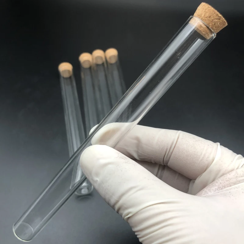 Пробирки стеклянные прозрачные с плоским дном и деревянными заглушками для