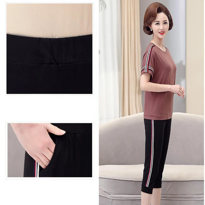

Mother casual outfits summer two piece Fashion O-Neck Pullover short sleeves top+Calf-Length Pants Loose Solid plus size sets