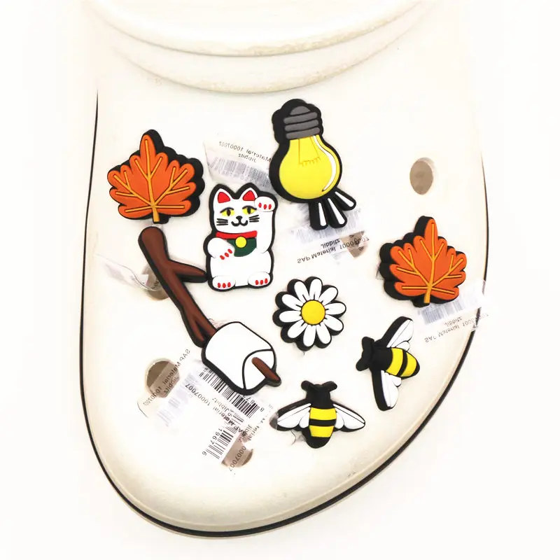 Original Maple Leaf/Lucky Cat/Daisy/Bee/Light Bulb PVC Shoe Charms Accessories Shoe Decoration for Croc jibz Party Kids Gifts