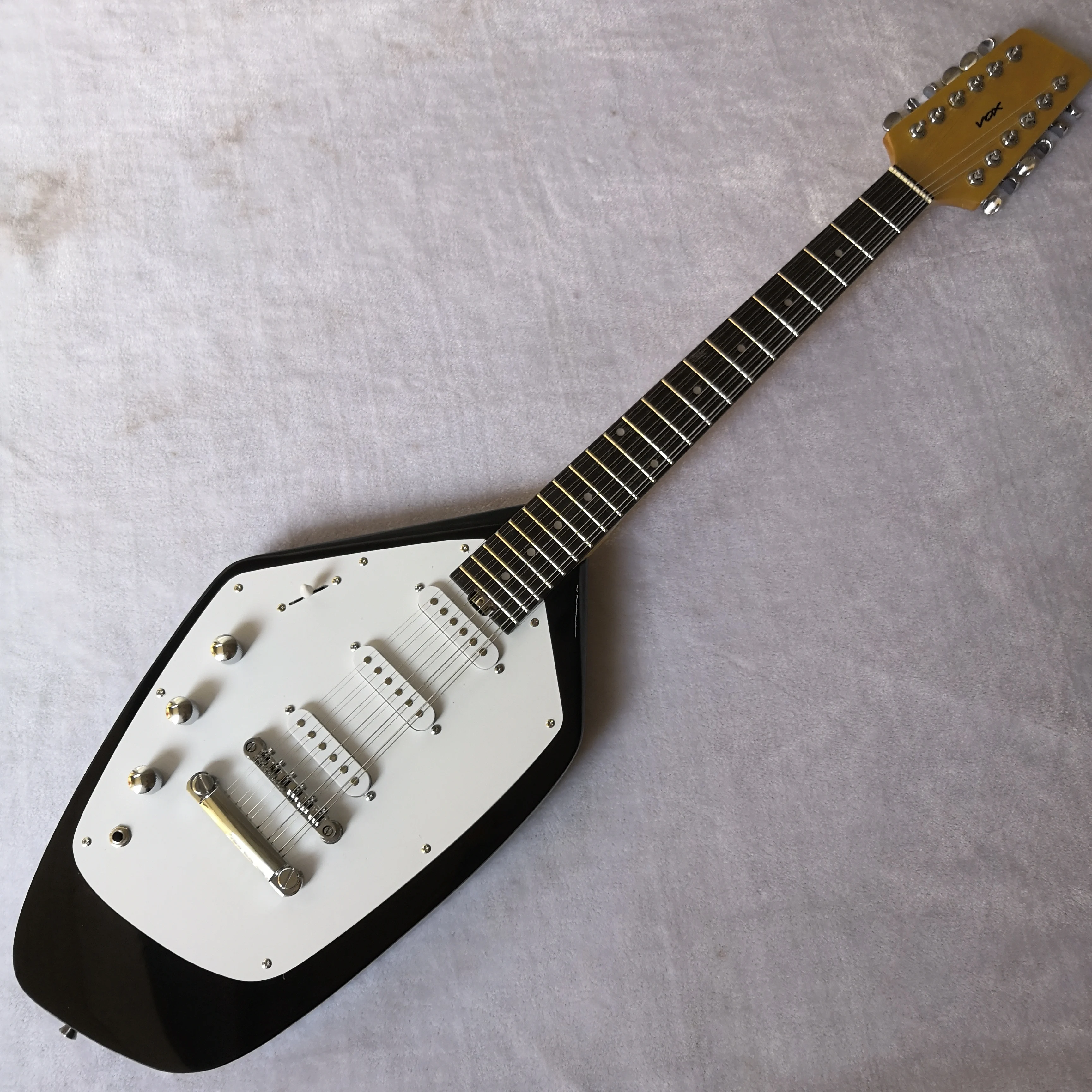 

left hand irregular 12 string electric guitar maple neck, black paint