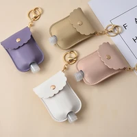 hot sell 60ml empty bottle keychain portable keyring free hand sanitizer pu leather case key chain disinfectant