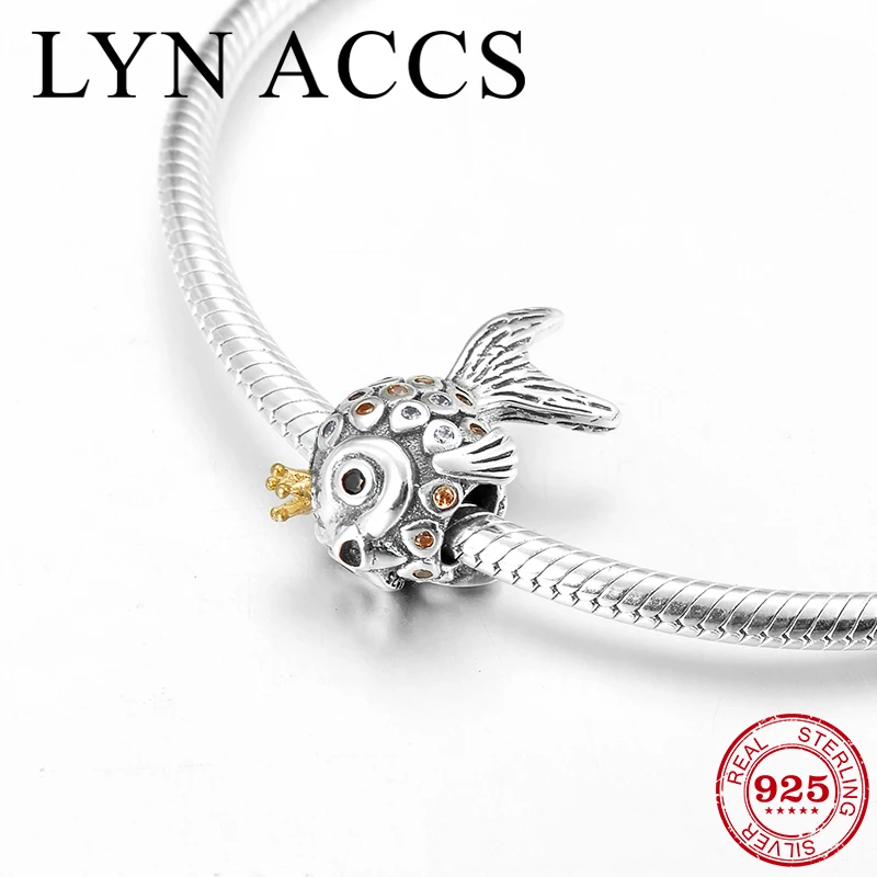 Ювелирные изделия из серебра 925 пробы с маленькими золотыми рыбками и короной |