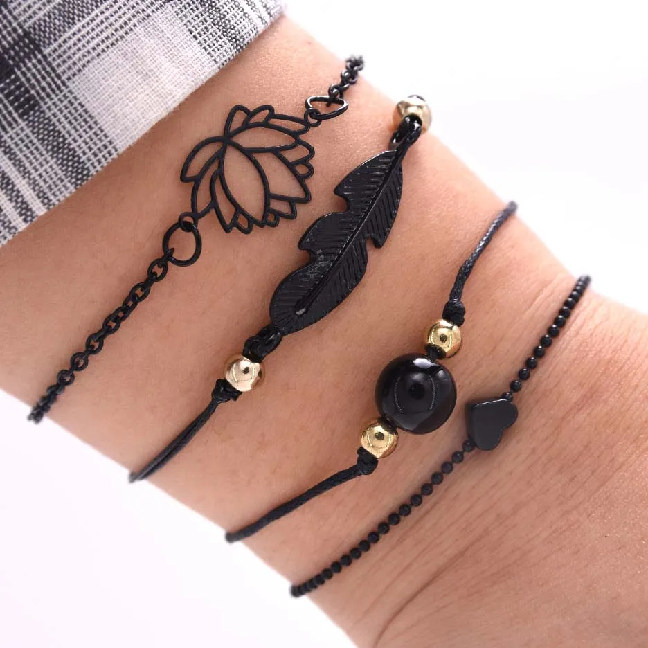 

Комплект женских браслетов в стиле «Бохо», комплект из 4 браслетов в готическом стиле с черными перьями и лотосом, очаровательные браслеты-ц...