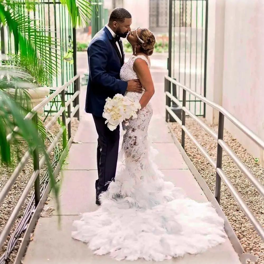 

See Through Feather Mermaid Wedding Dresses Sexy Bodice Long Train Bridal Gown South Africa Lace Wedding Dress Backless