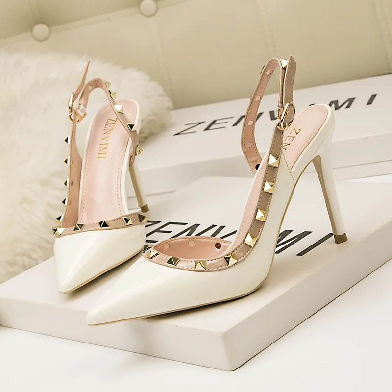 

Rivet hollow female sandals 10CM PUMPS Simple and fashionable sexy nightclub stiletto high heel shallow mouth pointed