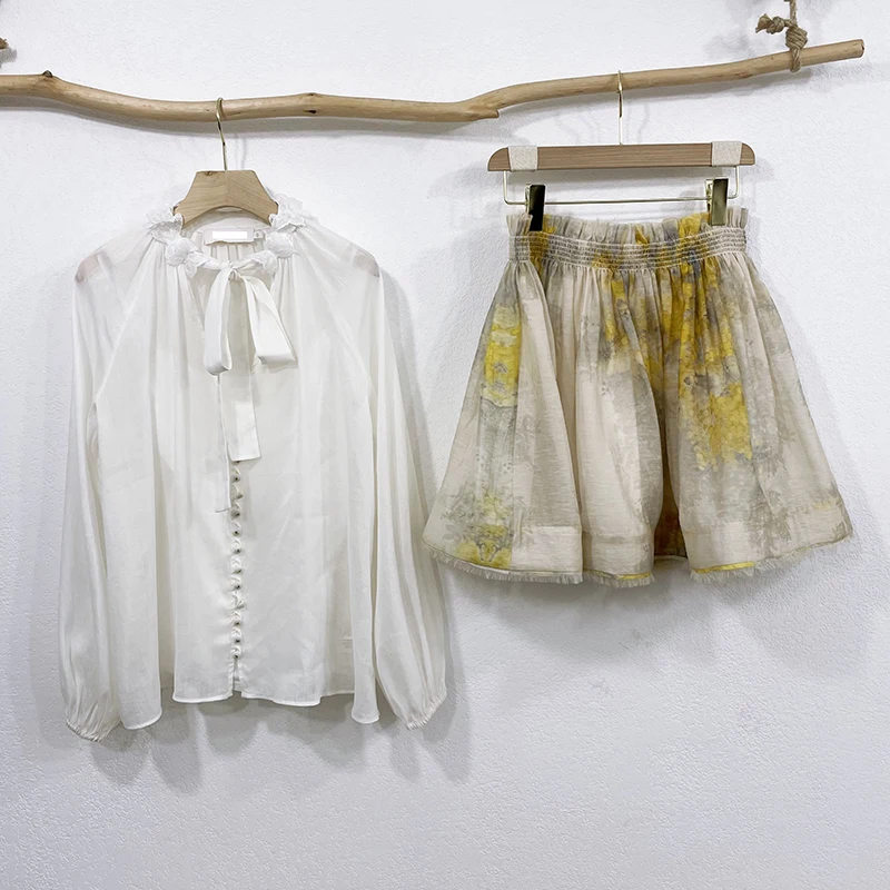 

2021 spring and summer new silk linen single-breasted long-sleeved solid color shirt + printed half skirt female