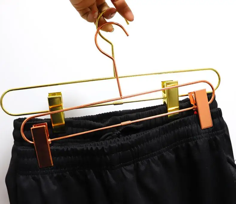 

Free shipping Nordic Style Rose Gold Metal Iron Trousers Hanger Rack Pants Skirt Clothes Clip Stand HangerwholesaleWholesale