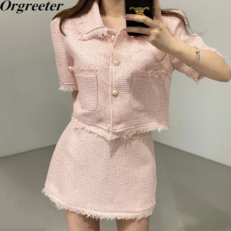 

Женский твидовый костюм с отложным воротником, пиджак с бахромой и жемчужной пряжкой и трапециевидная мини-юбка с высокой талией, комплект ...