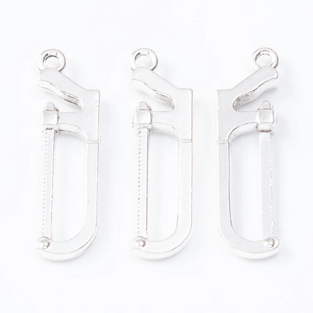 

125pieces antique bronze zinc alloy Saw jewelry pendants DIY jewelry making accessories 7659