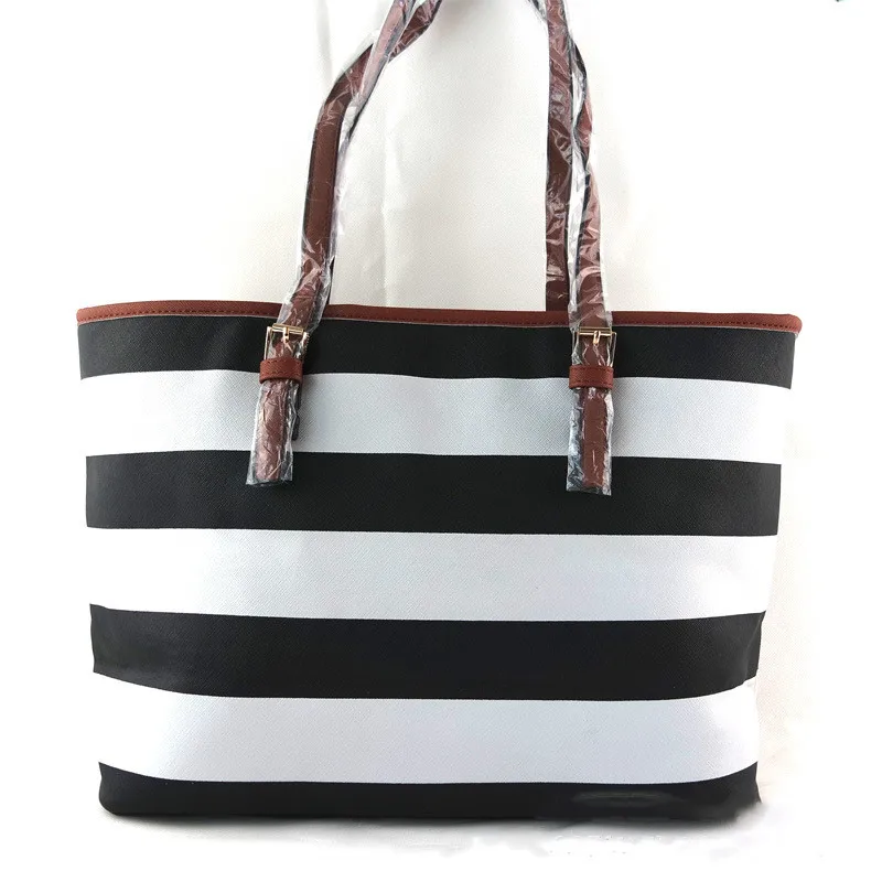 

Lady handbags new female bag navy wind a coarse grain moisture bag PU leather shoulder bag big bag