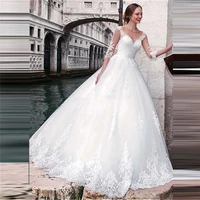 sheer long sleeves a line wedding dress buttons back lace appliques garden bridal gowns 2020 modest spring robe de mariage
