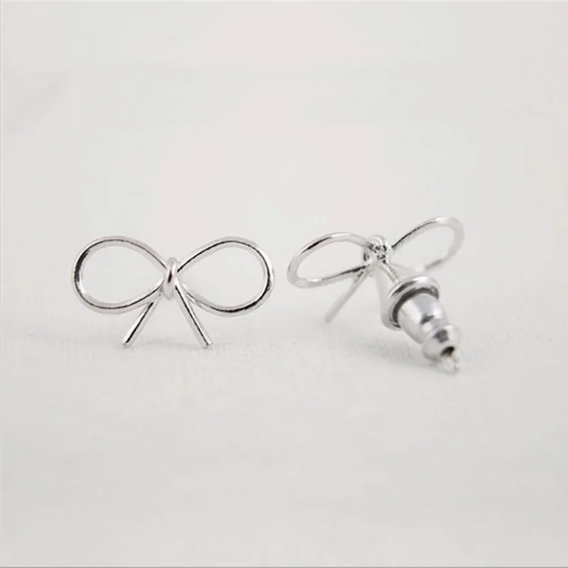 

Classic Bowknot Stud Earrings Smooth Surface Design