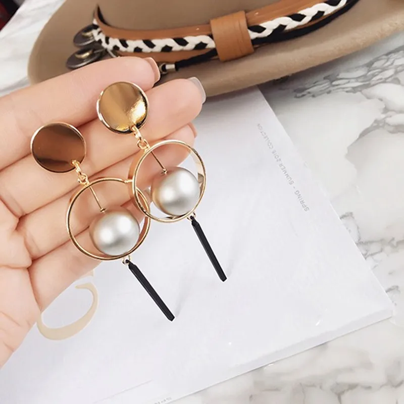 

personality asymmetric chain restoring ancient ways earrings geometric metal earrings Abstract face female temperament earrings