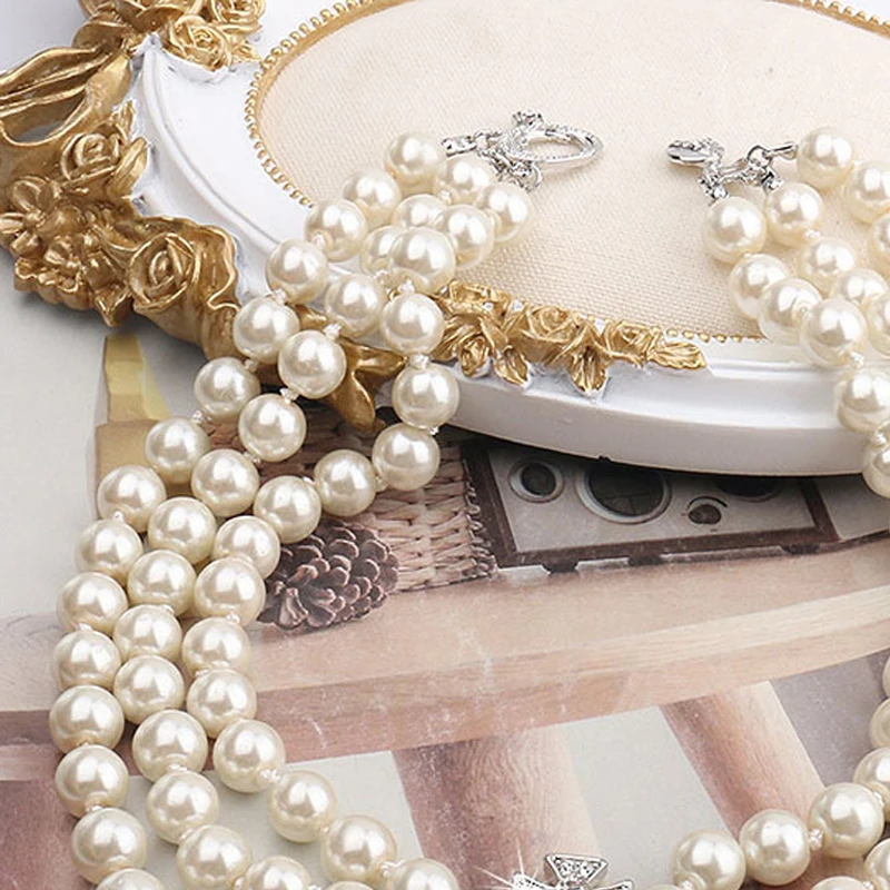 

Knobspin Ins Hot Fashion Diamond Crystal Saturn Pendant Cristal Naszyjnik Girls Pearl Choker Necklaces For Women Party Jewelry