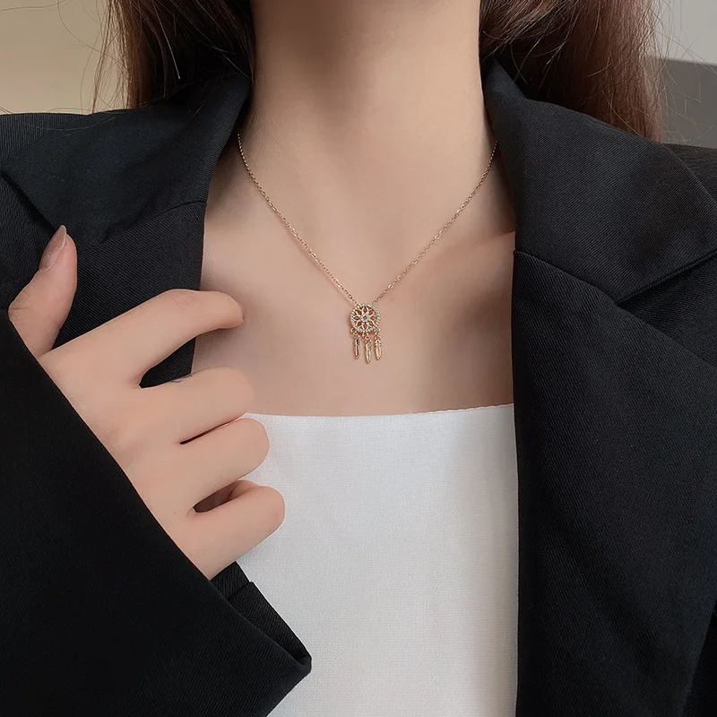

Simple and fashionable hollow round titanium steel zircon micro tassel pendant female necklace