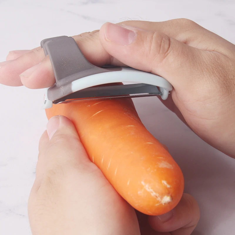 

Hot Sale Small Kitchen Tools Finger Fruit Vegetable Peeler Appler Mini Silicone Finger Peelers