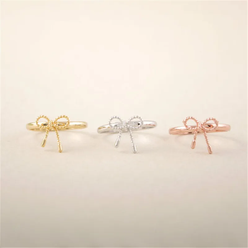 

Fashionable Lovely Bowknot RingsThree Color Optional for Women