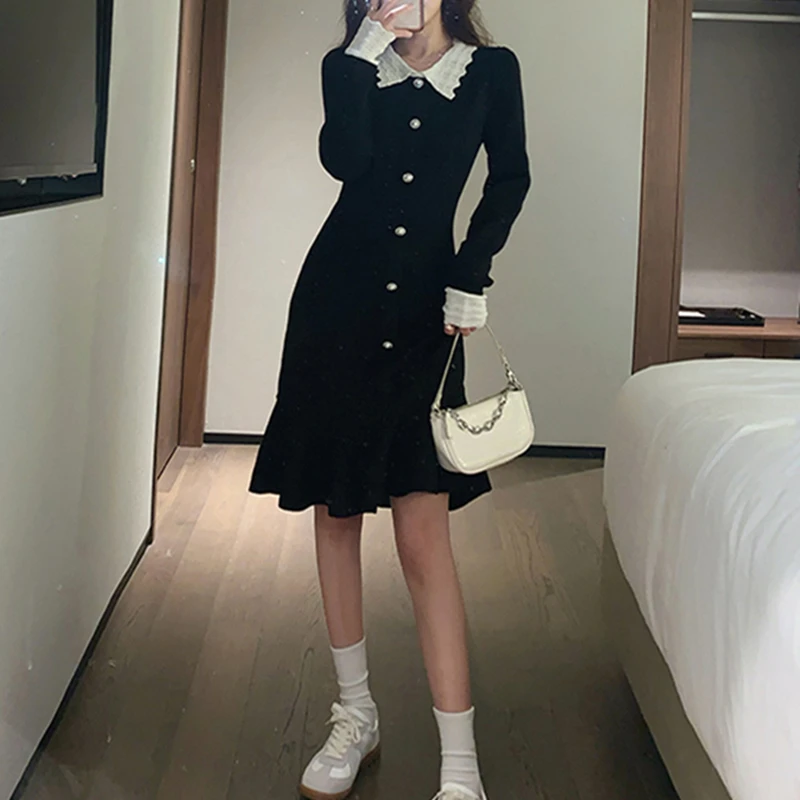 Женское однобортное вязаное платье-свитер элегантное облегающее черное