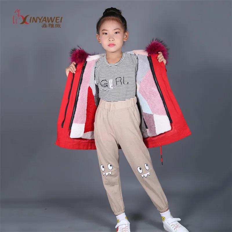 

Factory Direct Wholesale Variety Wide Coat Children's Female Winter Warm Coat Rex Rabbit Lining Accessories Raccoon Fur Collar.