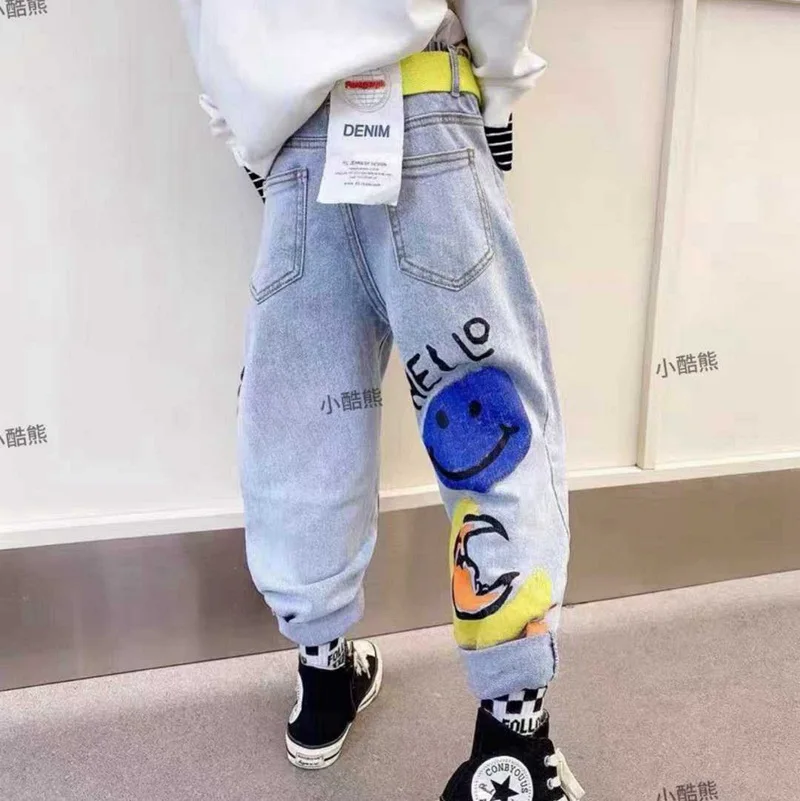 

Children's clothing 2021 spring new children's pants, boys and girls, cartoon rainbow graffiti jeans