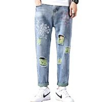 high quality spring mens personality printed ripped jeans casual korean version of hot rhinestone straight cropped trousers