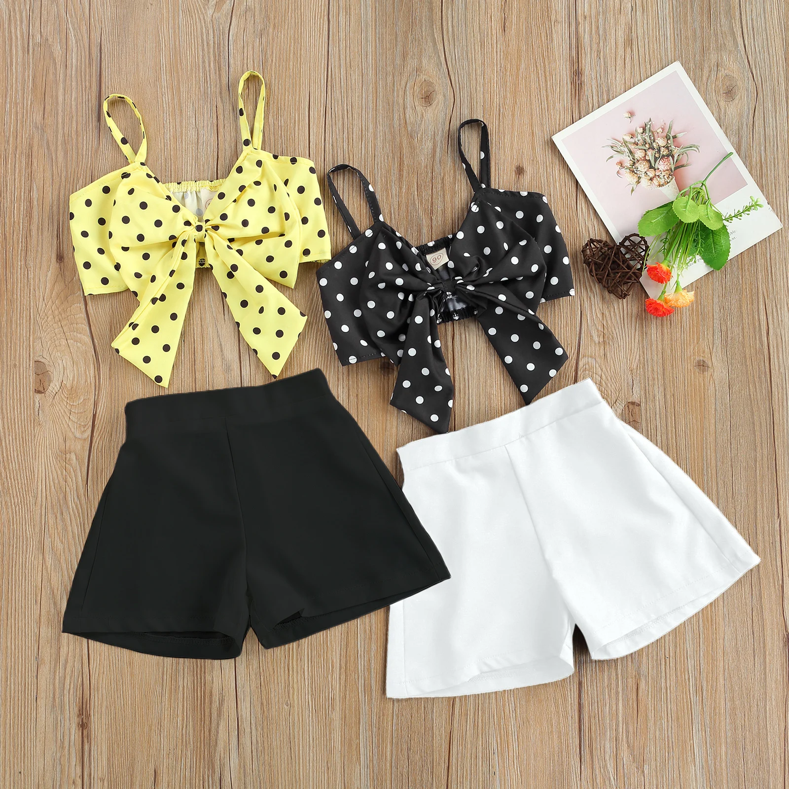 

2Pcs Toddler Summer Outfits Baby Girls Sleeveless Polka Dot Print V-Neck Bowknot Spaghetti Strap Crop Tops Solid Color Shorts