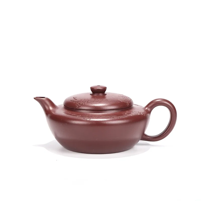 

Yixing purple clay teapot master hand made plum blossom Han flat teapot