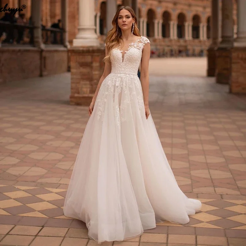 

ChuYu Elegant Tulle Cap Sleeve Scoop Neck Appliqued See Through Long A Line Bridal Wedding Gowns Beading Back Button 2021 New