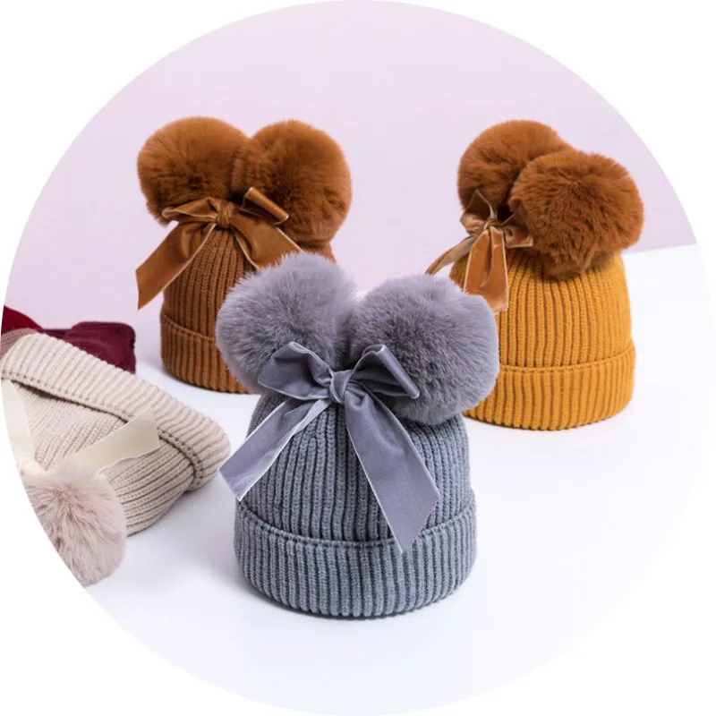 

Knitted hat double ball bowknot cute children's autumn and winter new style cotton warm baby hat