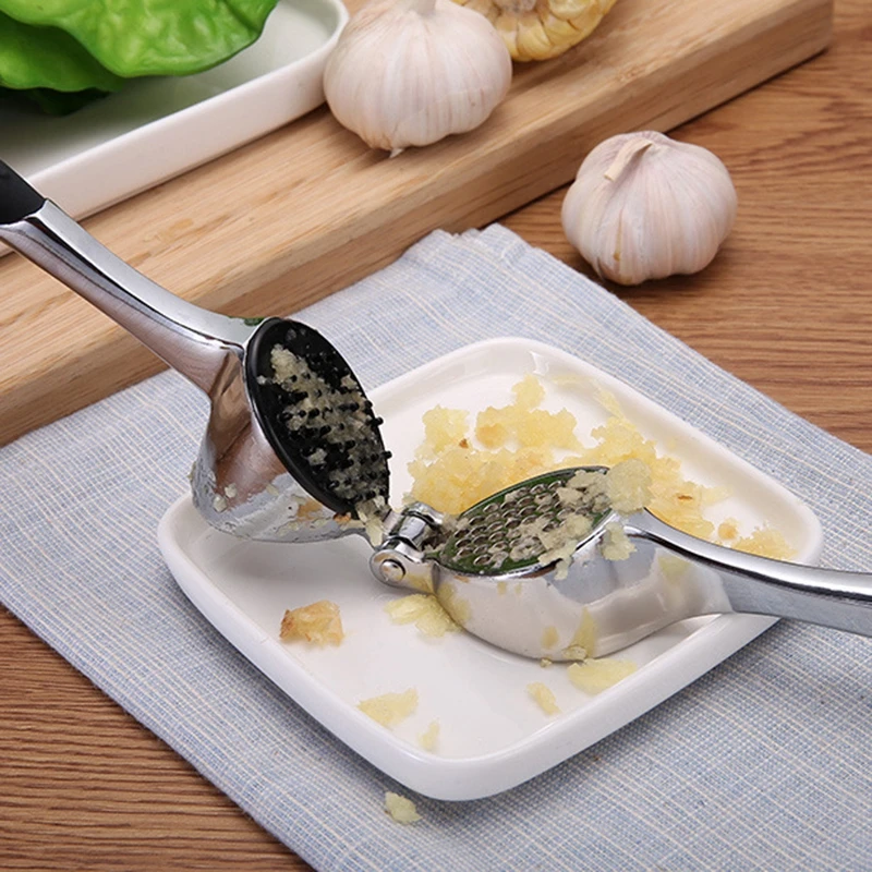 

Multifunction Stainless Steel Garlic Press Garlic Ginger Squeeze Crusher Slicer Tool