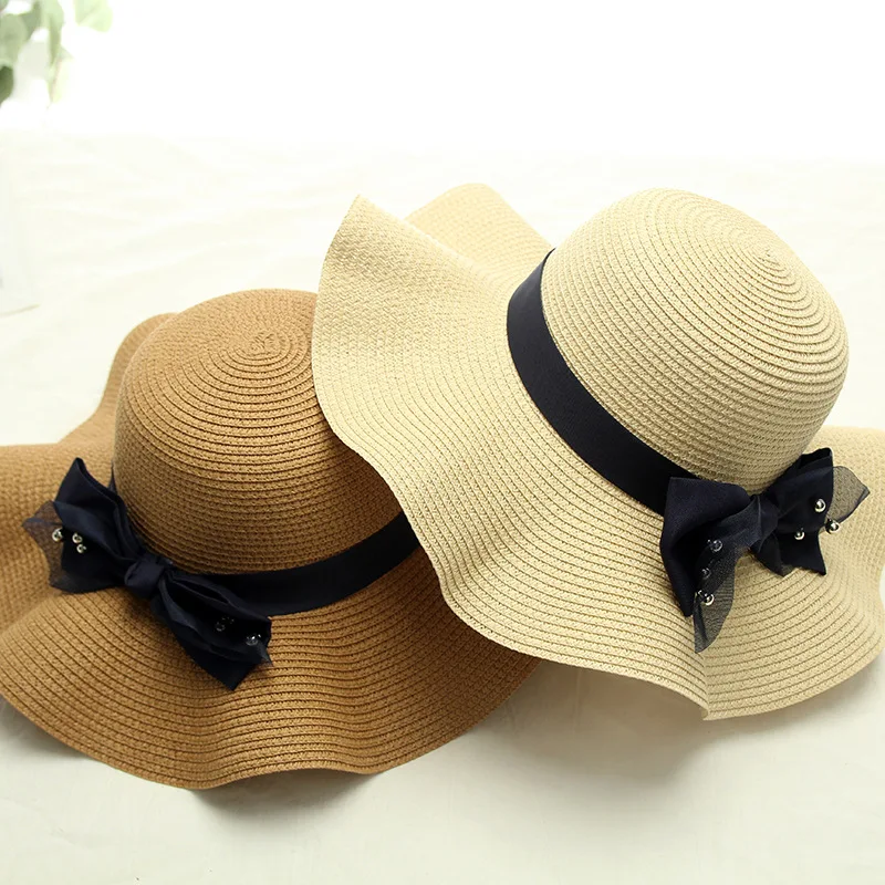 

Korean version hat lady summer bead bowtie wavy straw hat beach travel vacation sunshade hat