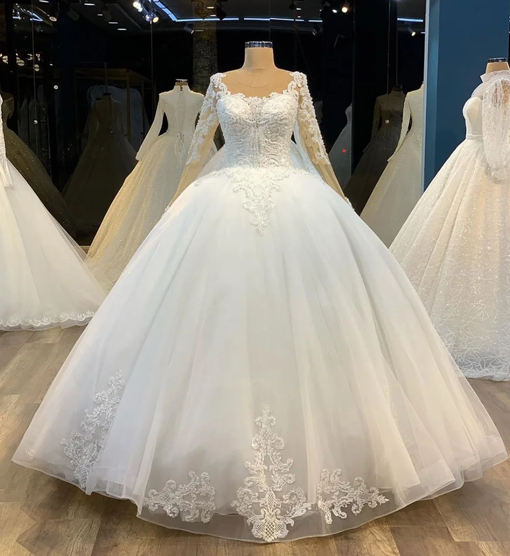 

Puffy Ball Gown White Long Wedding Dresses 2021 Real Picture Luxury Crystals Beaded Appliques Top Long Sleeves Bridal Gowns