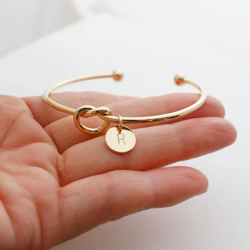 

WOMEN LOVE KNOT BANGLE BRACELET WITH INITIAL DISC PERSONALIZED BRIDESMAID GIFT BFF BRACELET STACKING BANGLE MOM DAUGHTER WEDDING