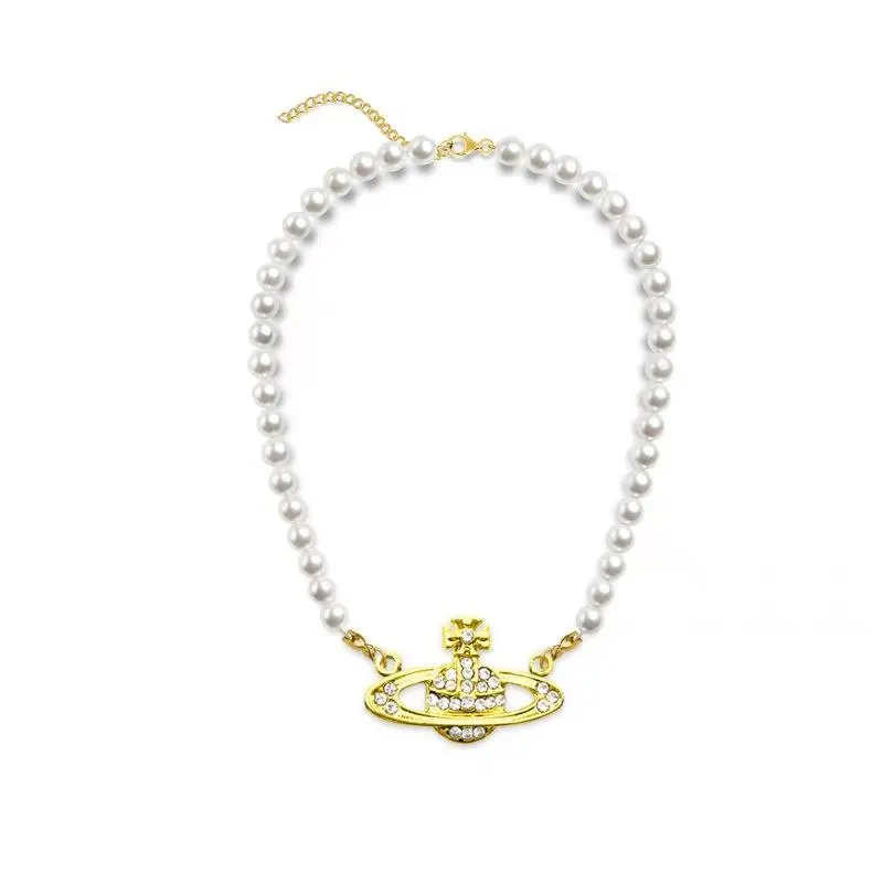 

Golden Saturn Pearl Necklace Diamond Pearl Bead Crystal Rhinestone Saturn Planet Necklace Special beautiful Fashion trend Choker