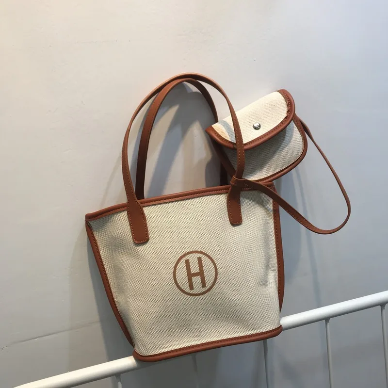 

European, American and Korean style new women's Bag Canvas H letter three piece set simple women's portable multi-purpose bag