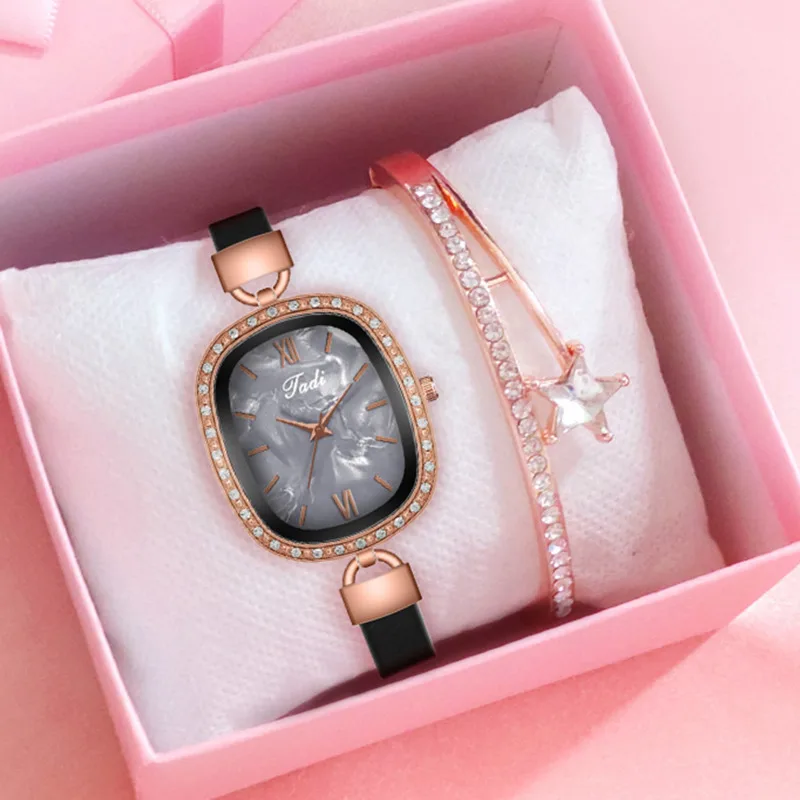 

Часы женские с овальным жемчужным циферблатом и кожаным ремешком