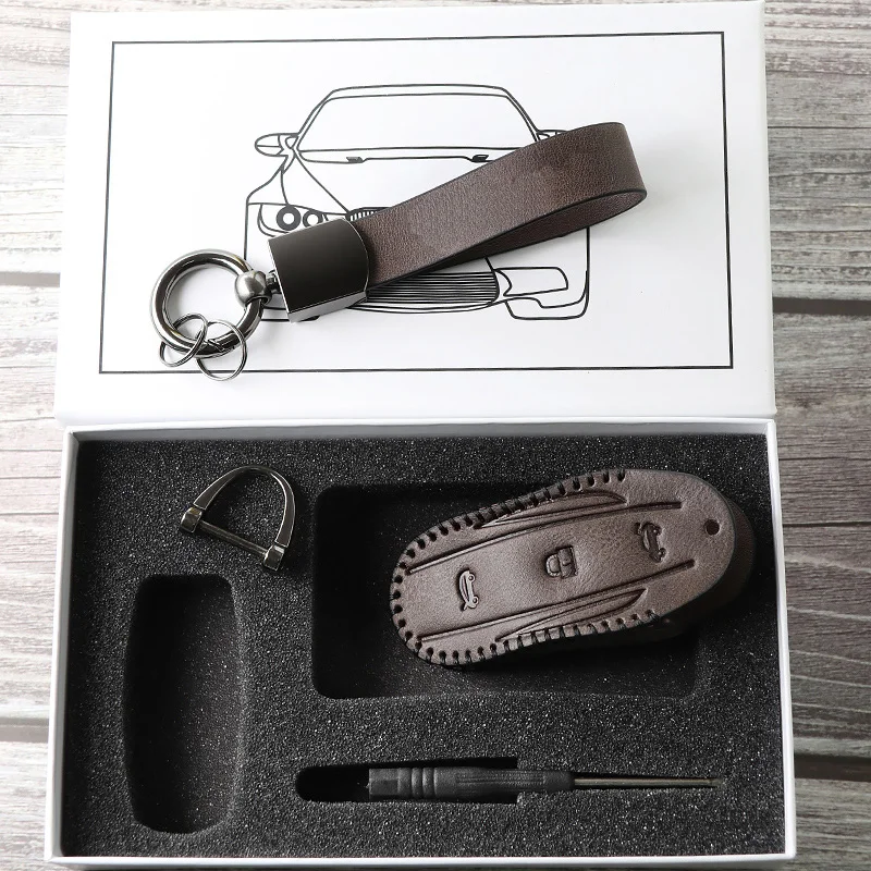 

Genuine leather key case for car Tesla Inc model x key case leather models car key case buckle shell high-end