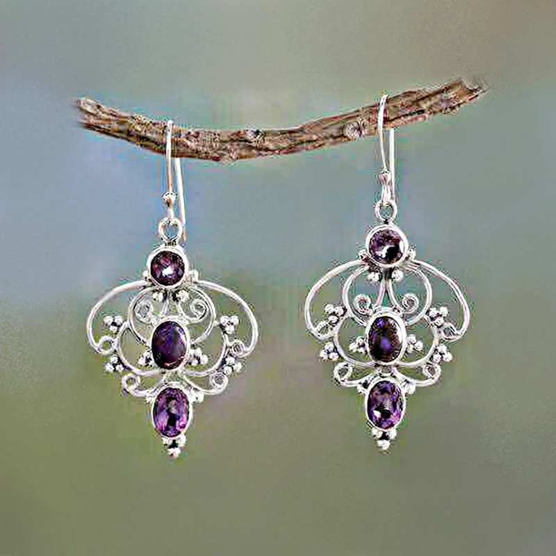 

Retro Thai Silver Purple Dragon Crystal Petal Earrings European and American Peach Blossom Purple Turquoise Pendant Earrings