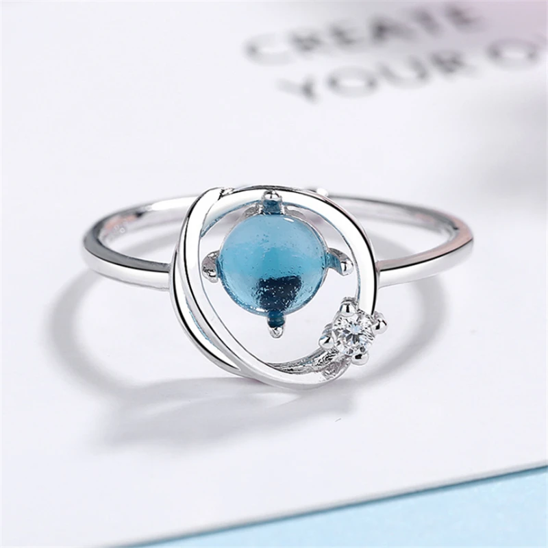 Новая коллекция изящных романтических регулируемых колец с голубыми планетами и