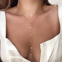 2022 new fashion jewelry gold web celebrity collarbone chain metal retro pearl pendant ladies asymmetric tassel necklace