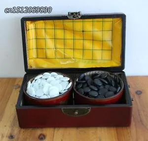 

Elaborate Chinese go board suit, Goban suitcase and black and white chess pieces